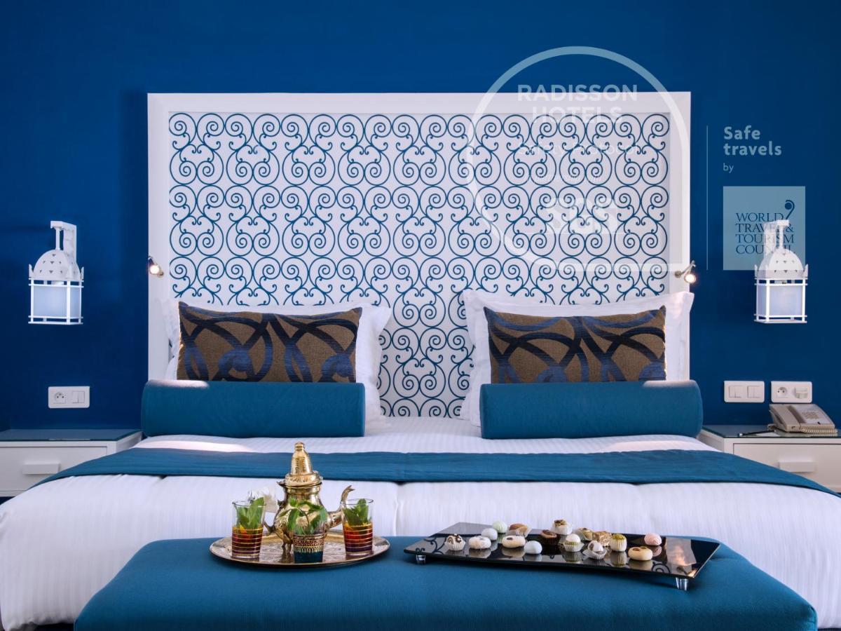 Radisson Blu Resort & Thalasso האממט מראה חיצוני תמונה A bedroom at Radisson Blu Hotel, Marrakech